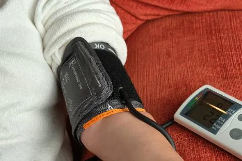 a close-up of a person taking blood pressure