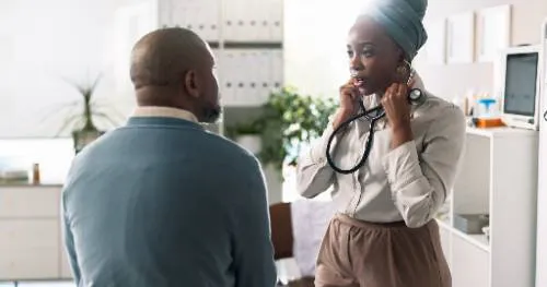 doctor with a patient for exam